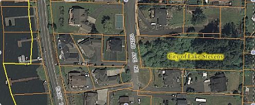 Lot with waterfront on left