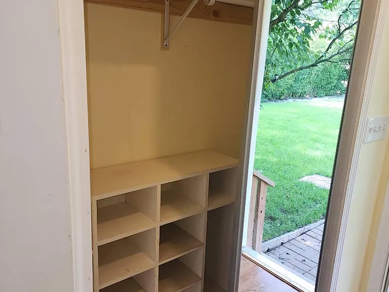 Back door entrance with closet