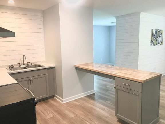 Kitchen area (foreground) bedroom and living area (background)