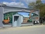 Another masterfully done mural. See how the door was incorporated into the mural?