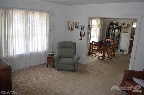 Large living room with easy access to dining room.