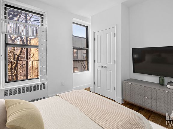 3rd image of 418 E 9th St APT 3B