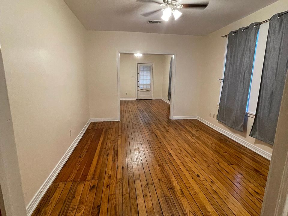 Bedroom 1, living room through doorway