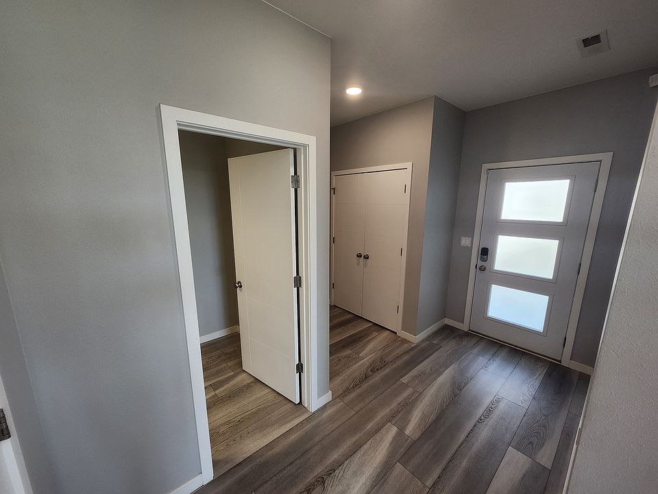 Looking toward main door entrance and entry hallway.