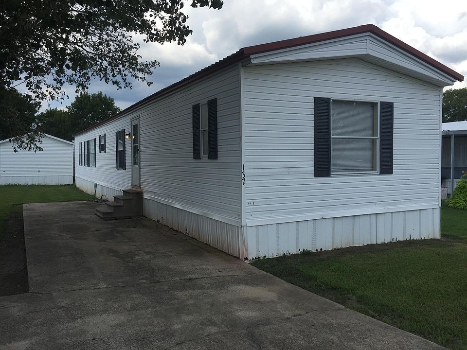 metal roof with vinyl siding
