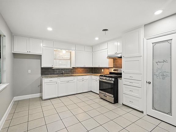 4th image of 8704 Greenmound Ave
