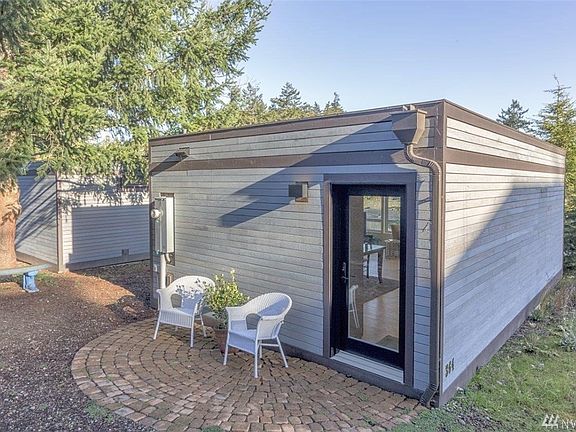 Property is 7500 sq feet and abuts a city right of way that is part of the Port Townsend non-motorized trail system.