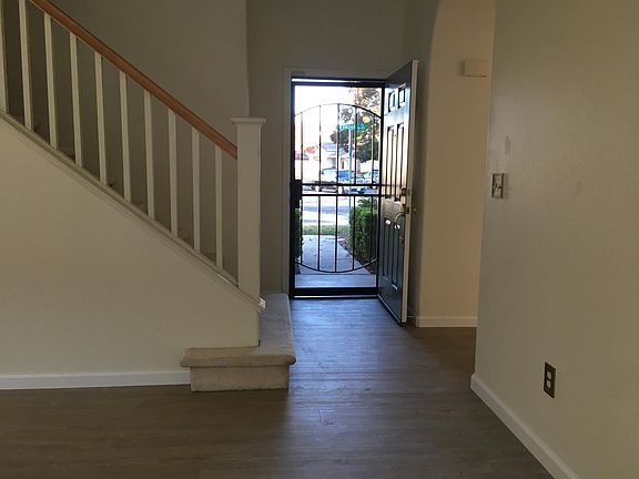 Entry and Living Room, new floor, new painted interior