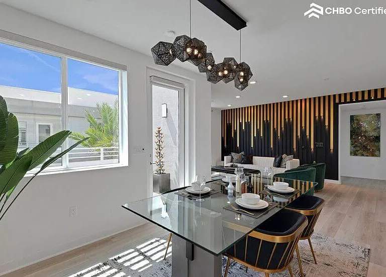 Forbes-level design accents, black/brass elements throughout