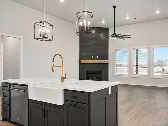 The kitchen of the Hefner sits right next to the family room.