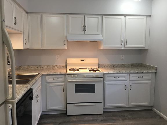 New cabinets counter tops and sink 