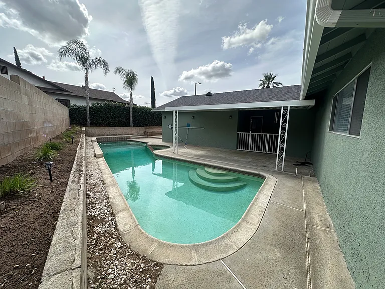 Covered patio, low maintenance backyard.