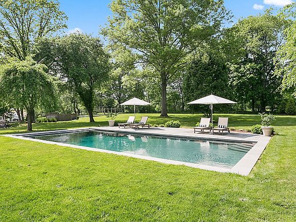 The heated Gunite pool is simple and elegant.  An electric cover provides safety when the pool is not in use.