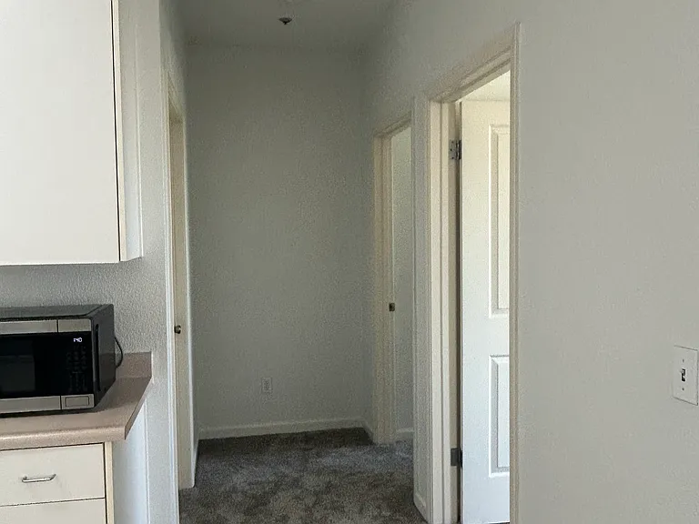 Hallway to Bedroom #2, #3, and Bathroom