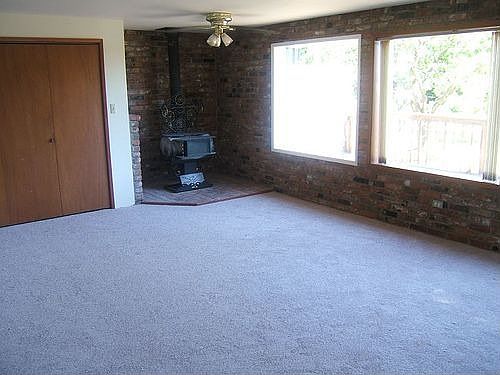 Large windows around family room. 