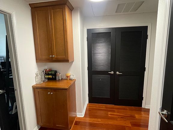 Hall way to guest room, laundry room and second bathroom.