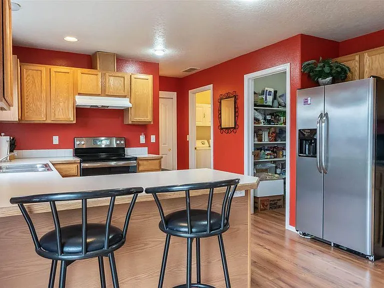Kitchen with included Fridge