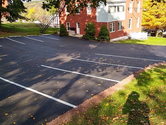 Parking lot in the back of the apartment house.