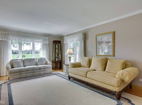 Large living room features beautiful hardwood floor