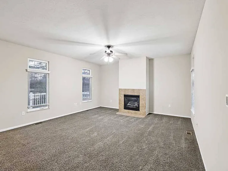 xpansive living areas offer plenty of room to relax, gather, and enjoy cozy evenings by the fireplace.