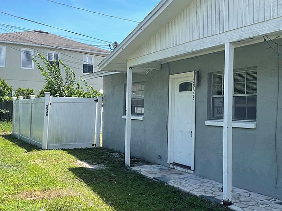 Parking and fenced in backyard
