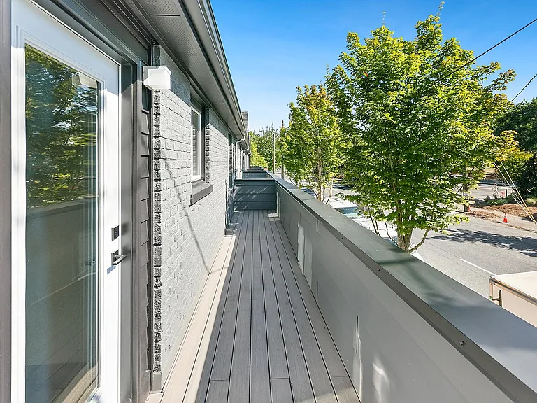 This unit has a massive private deck