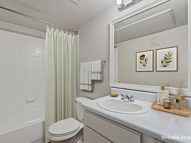 Bright, spacious bathroom with modern fixtures in a luxury apartment at Ovation Apartments in Austin, TX.