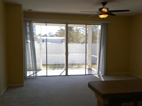 great room view to screened patio