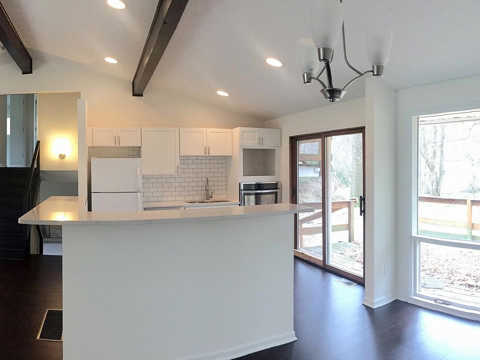Main Floor with Open Kitchen and Vaulted Ceilings
