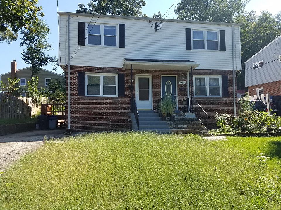 Exterior of House Showing Both Duplexes.