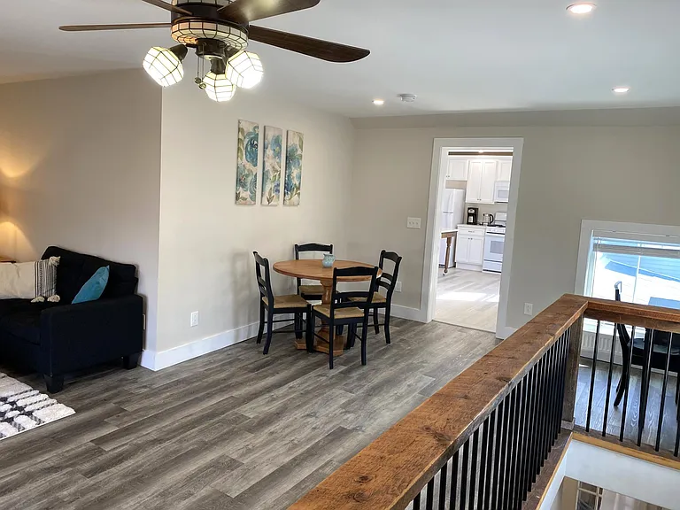 Furnished living/dining space.