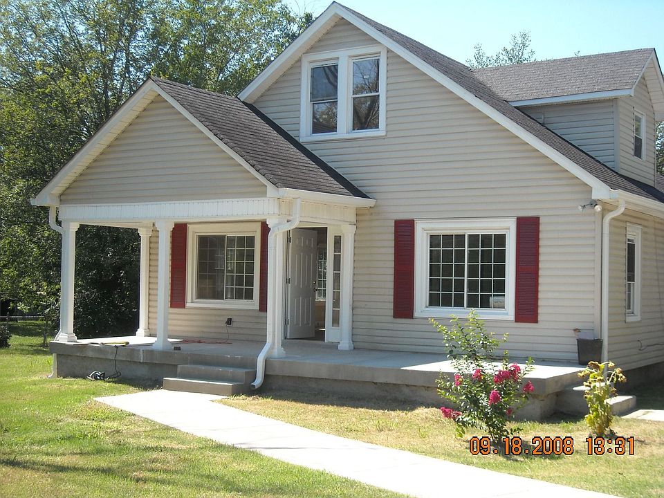 spacious porch and front yard