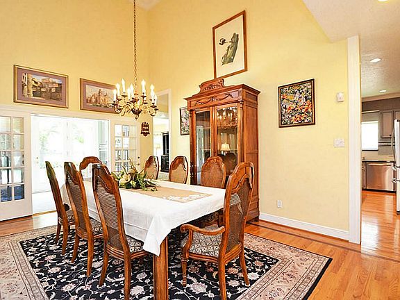 Home has great flow and easy to entertain in! From here access the kitchen, den and sunroom/lanai!