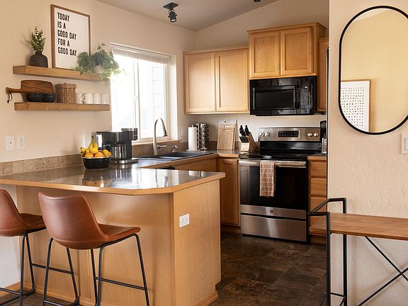Kitchen - New Delta Faucet and Whirlpool microwave - New bar stools