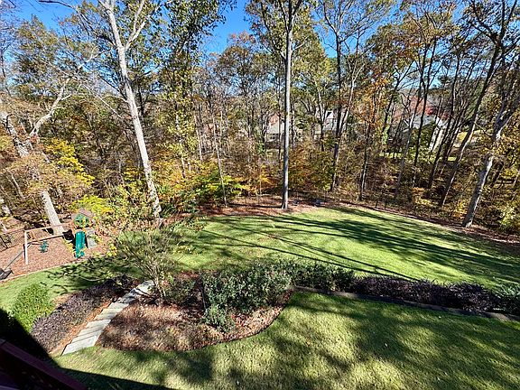 Spacious, private, and serene fenced backyard