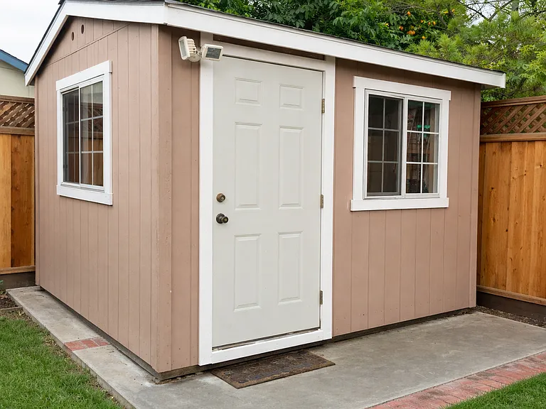 Storage shed with shelving