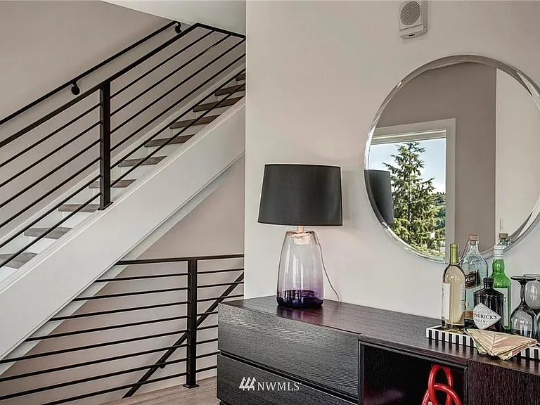 Beautiful hardwood flooring throughout, including the stairs