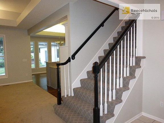 Designer stair carpet and updated spindles.