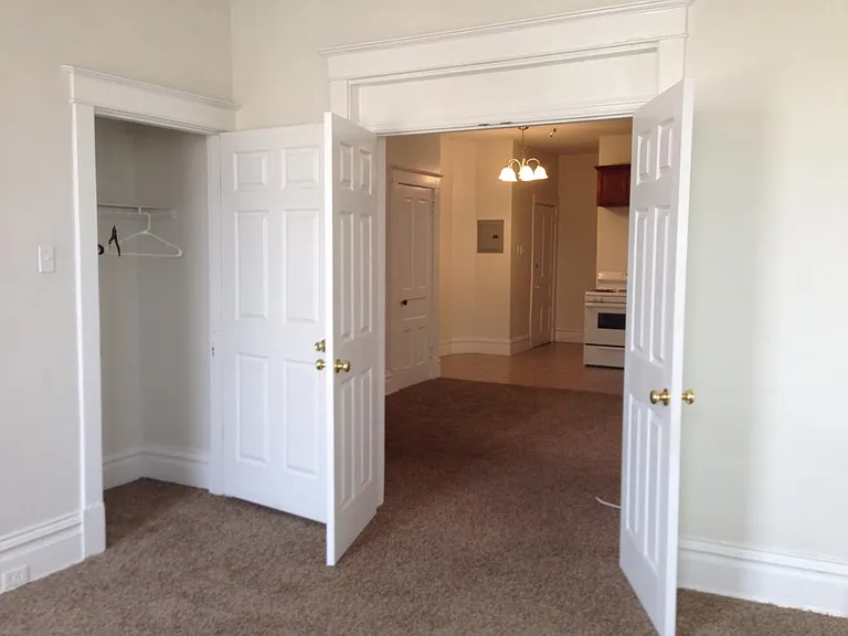 larger bedroom with double doors