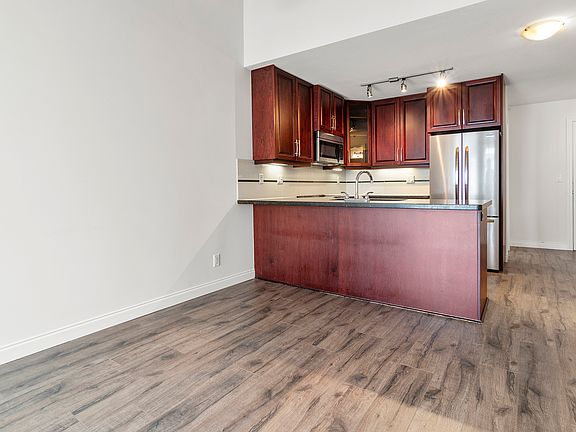 2nd image of 19939 55a Ave #408