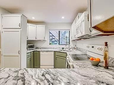 Bright updated kitchen with plenty of counter space.