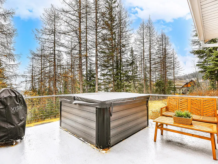 Enjoy amazing views from an 8 person hot tub on the private patio