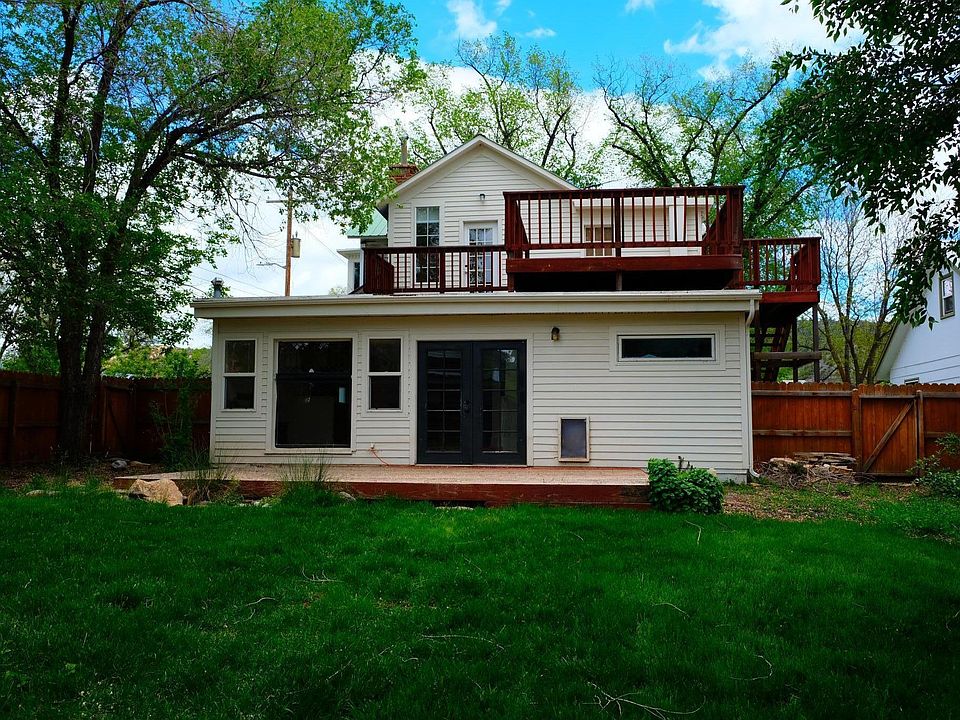 View of private deck from the backyard (backyard is reserved for downstairs tenants use)