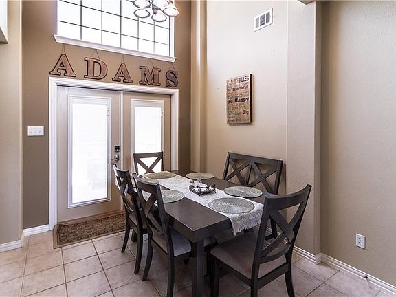 French doors open to patio!