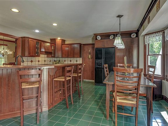 Solid Cherry Cabinetry & Corian Counter