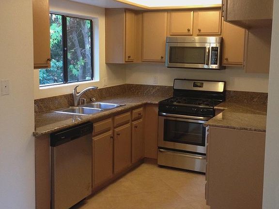New Appliances, Designer Lighting, Granite, Tile