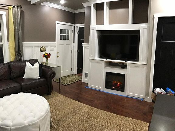 Built-ins with fireplace in living room