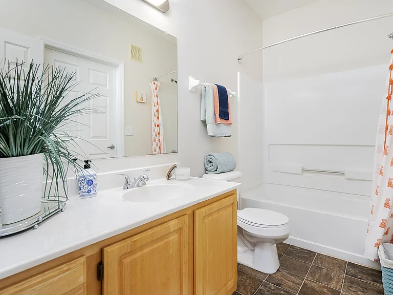 Start your day in a bright, clean bathroom designed for comfort and convenience.