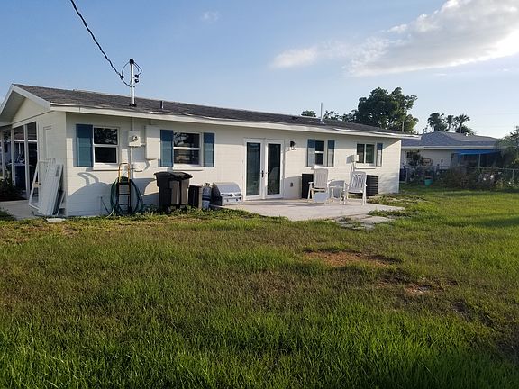 Large back yard with patio.