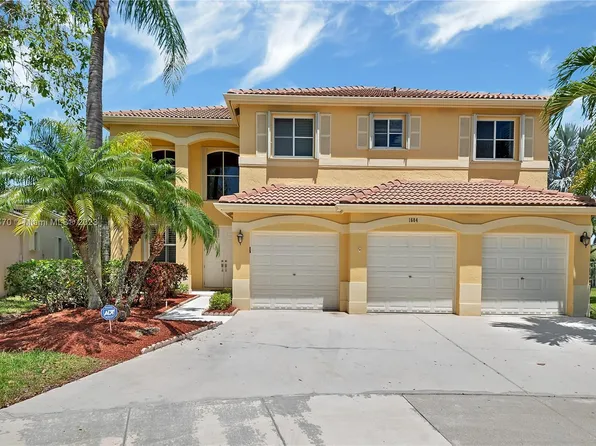 1684 Sparrow Ln, Weston, FL 33327